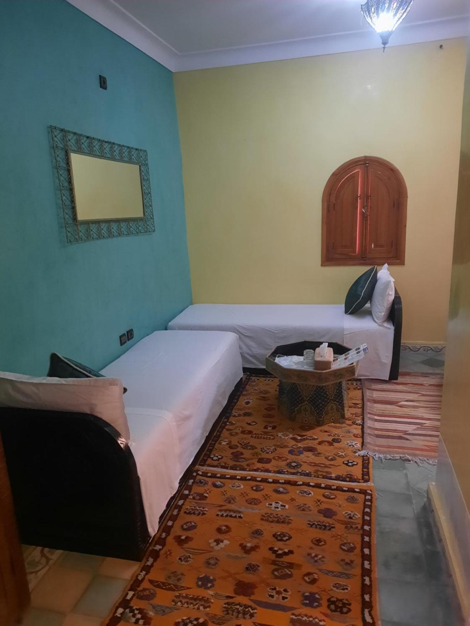 Riad Ouhmidi *