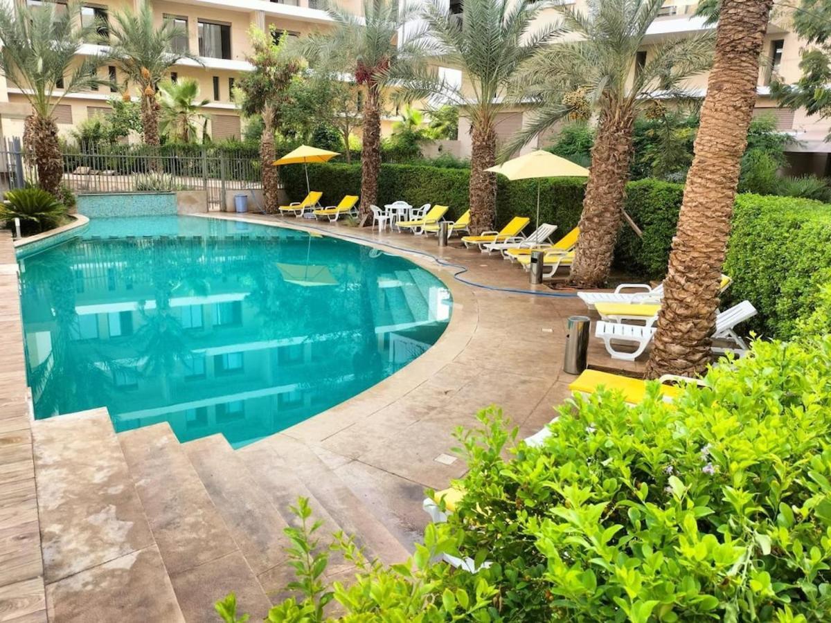 Bel A Marrakech Dans La Pearl Garden Avec Piscine Situee Sur La Route De Casablanca Sa Grande Terrasse A Splendide Vue Sur La Et Les Montagnes De L'atlas A Quelques Minutes Du Centre Et Du Grand Stade De Marrakec Apartment *