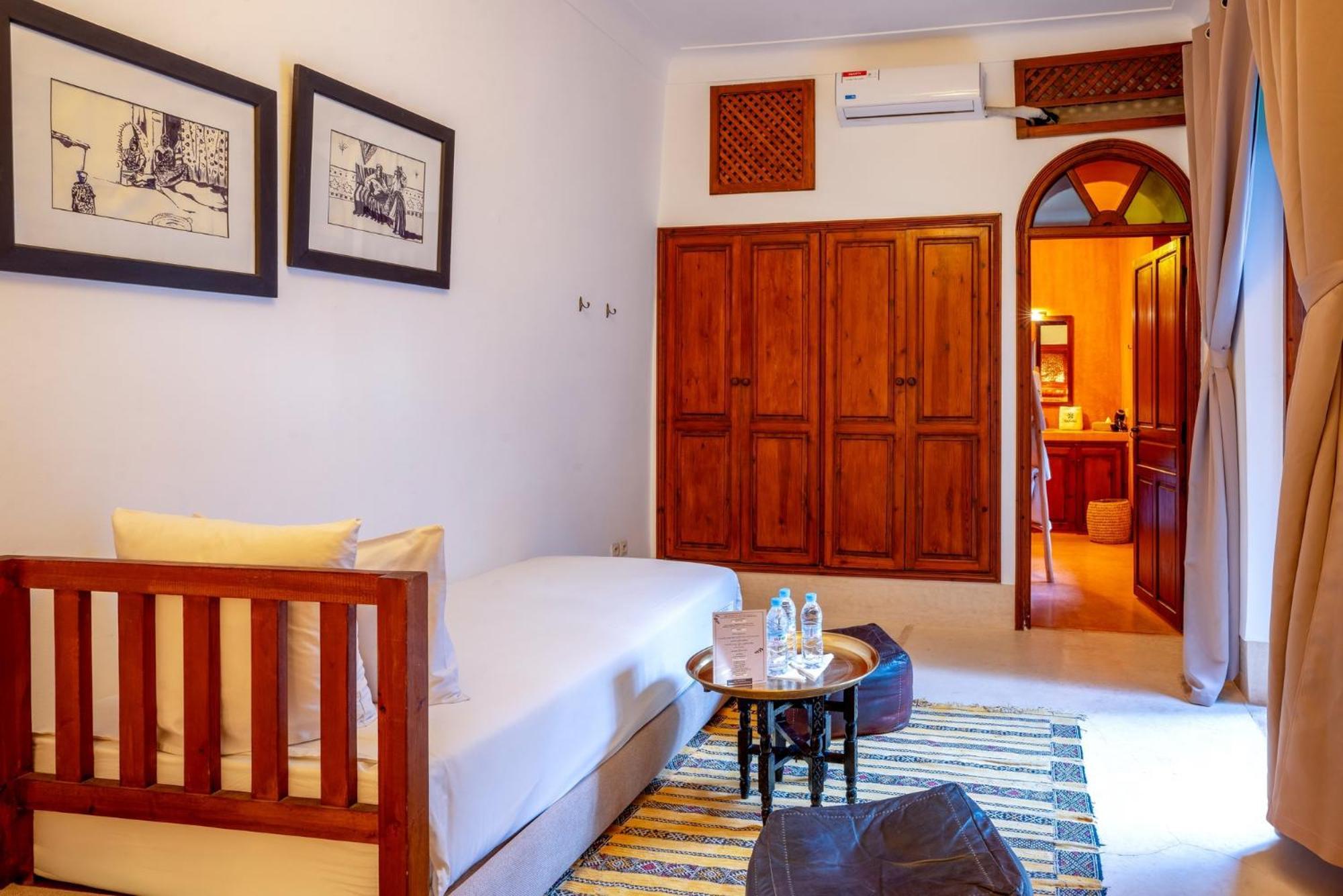 Riad Adika &