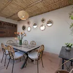 Riad Le J