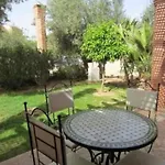 Superbe appartement Rez de jardin / palmeraie village