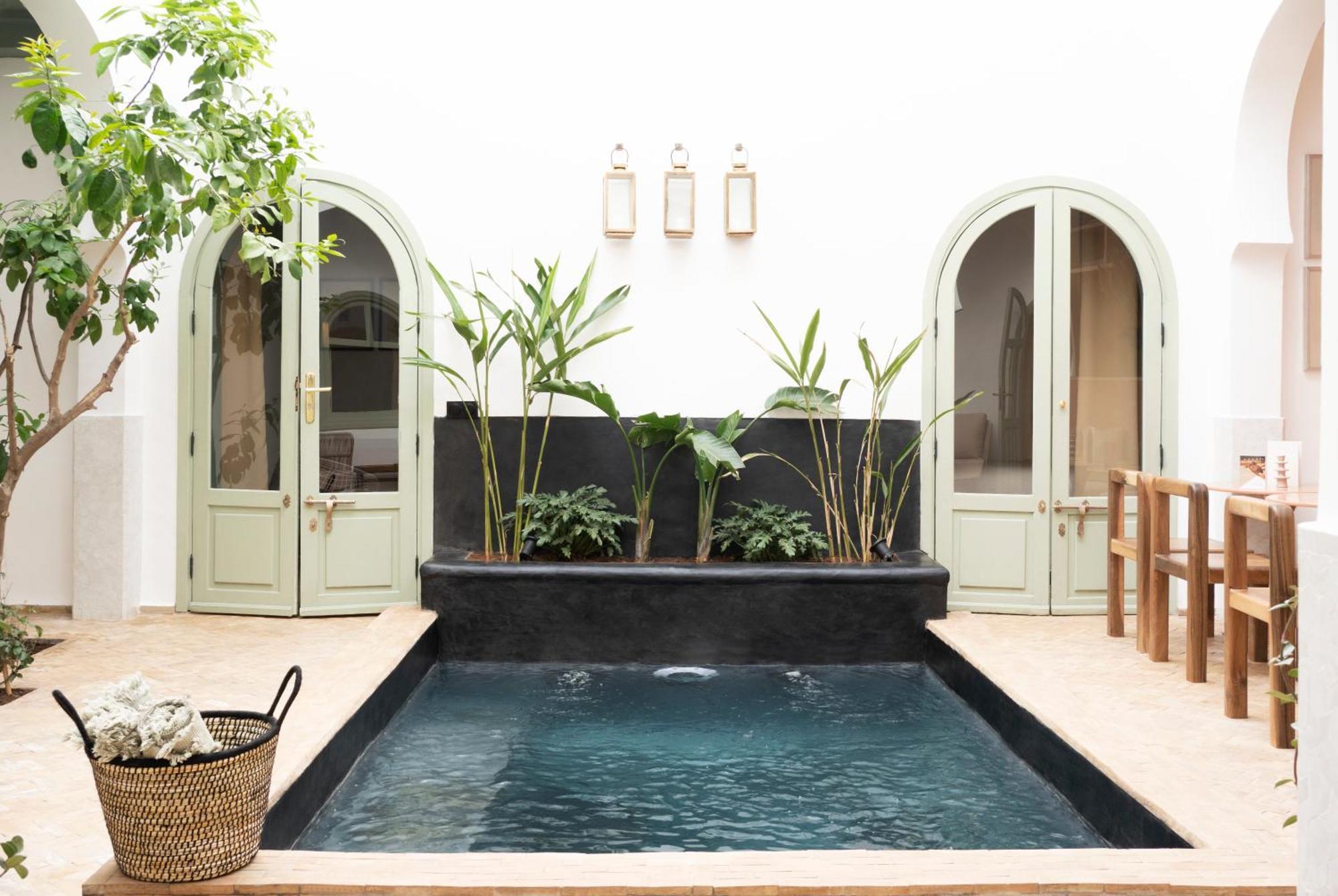Al Uzza Riad *
