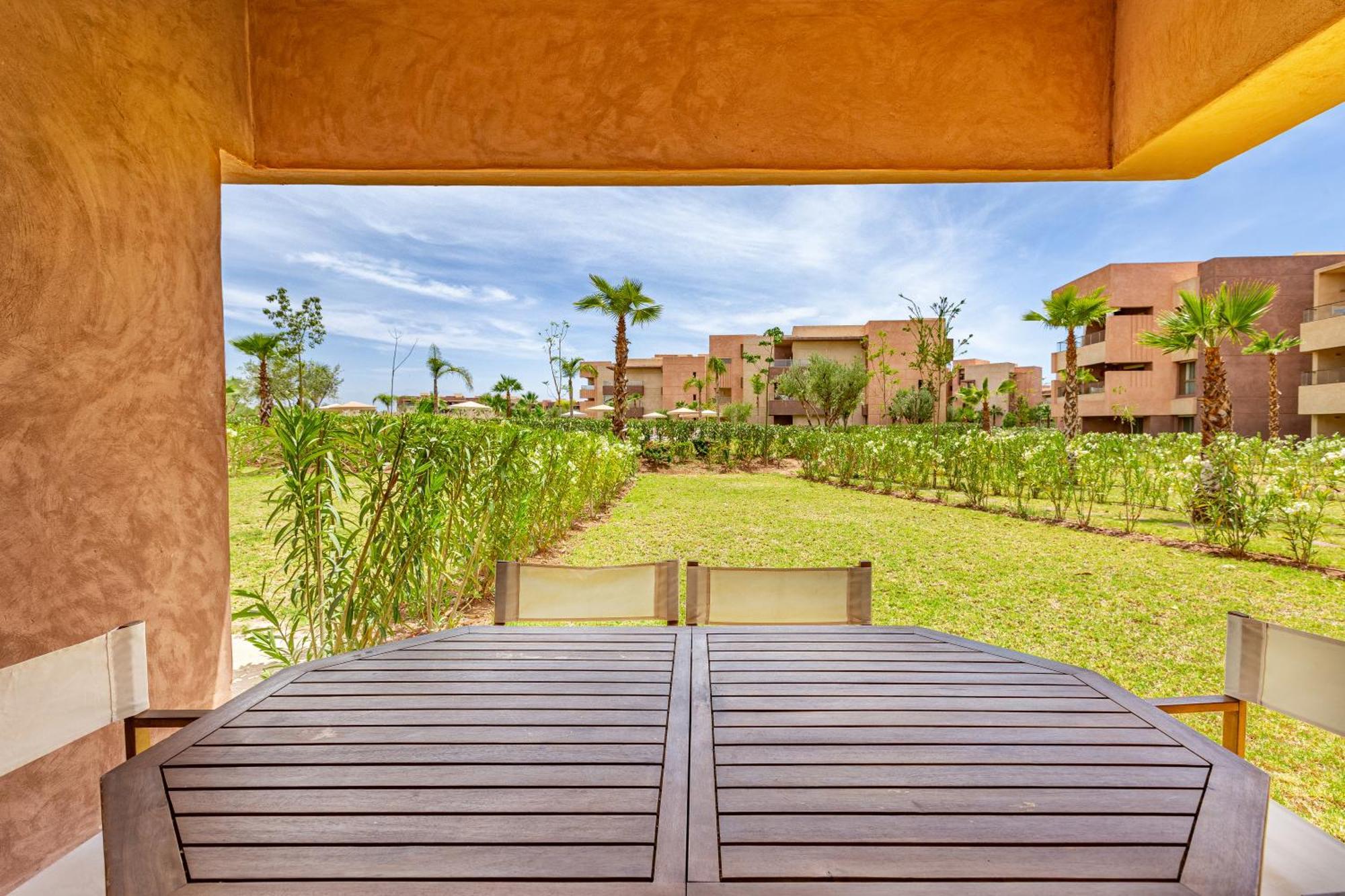 Luxury Garden-level With Poolside Serenity