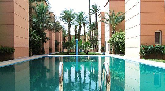 Riad Naim *