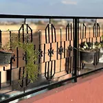 Apartment With Rooftop Access
