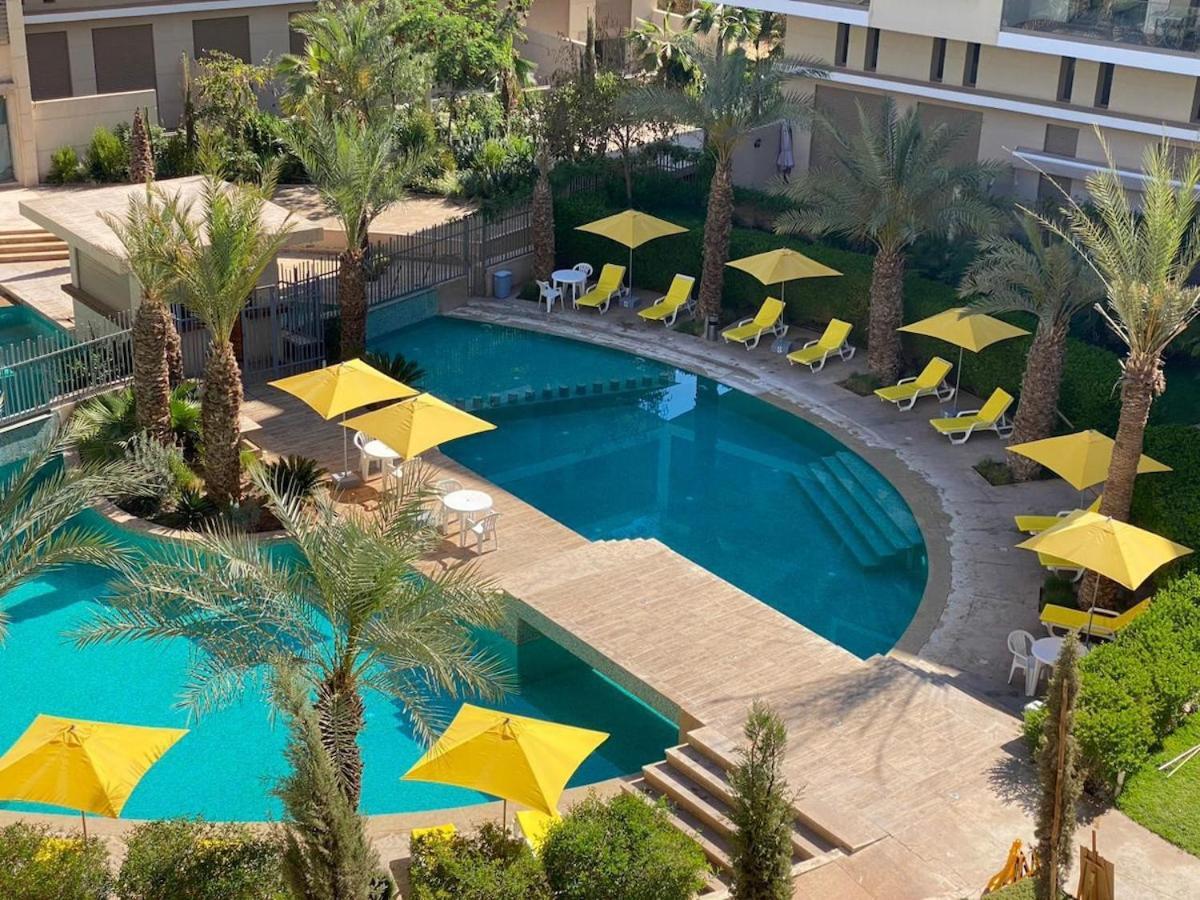 Apartment Bel A Marrakech Dans La Pearl Garden Avec Piscine Situee Sur La Route De Casablanca Sa Grande Terrasse A Splendide Vue Sur La Et Les Montagnes De L'atlas A Quelques Minutes Du Centre Et Du Grand Stade De Marrakec Marrakesh