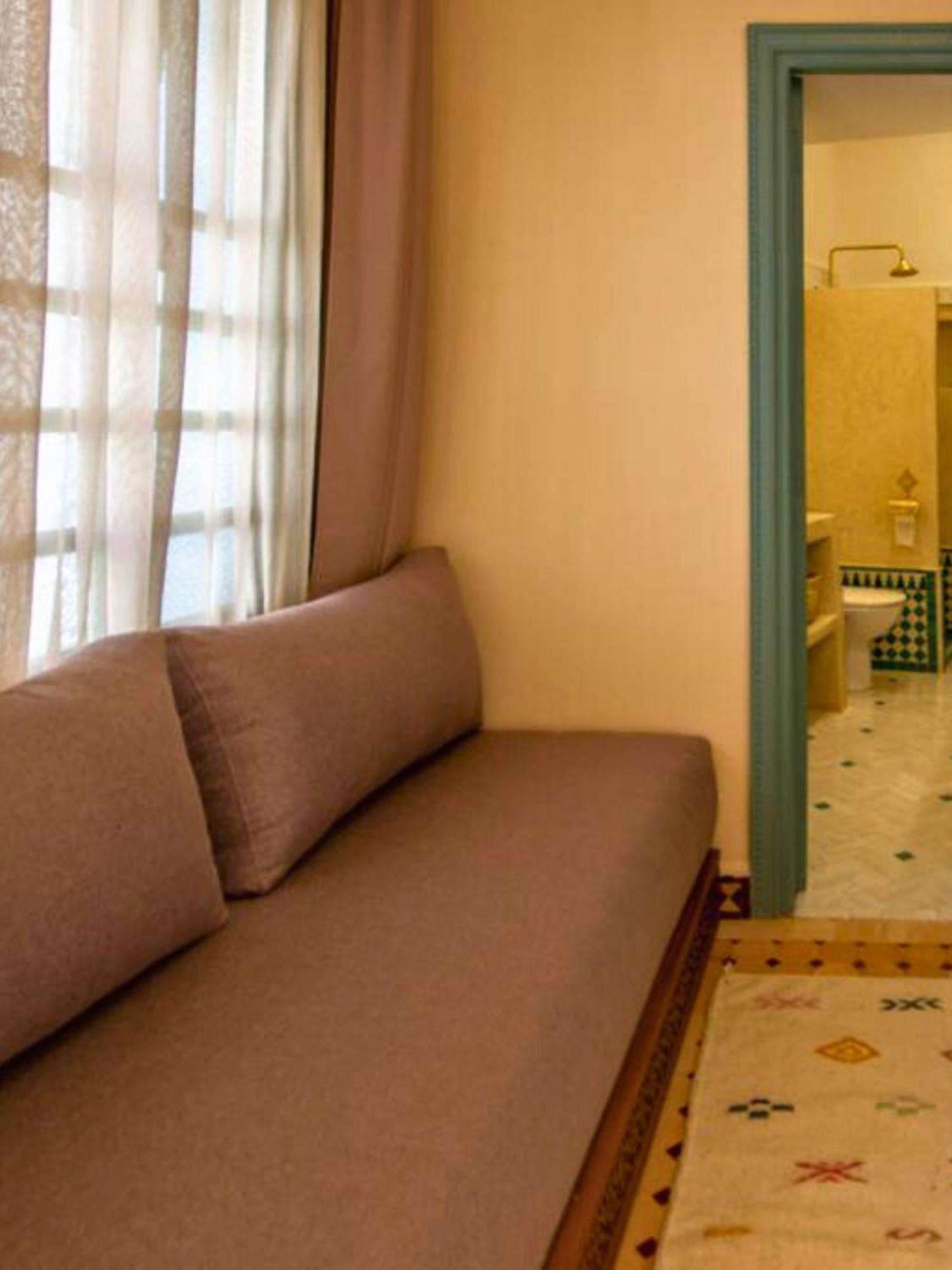 Riad Jalina *